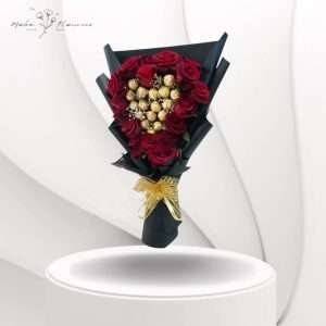 Red roses bouquet with chocolate code