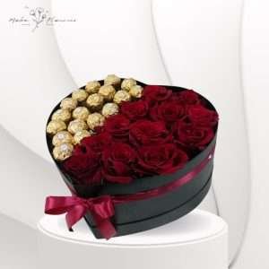 Box of red roses with chocolate