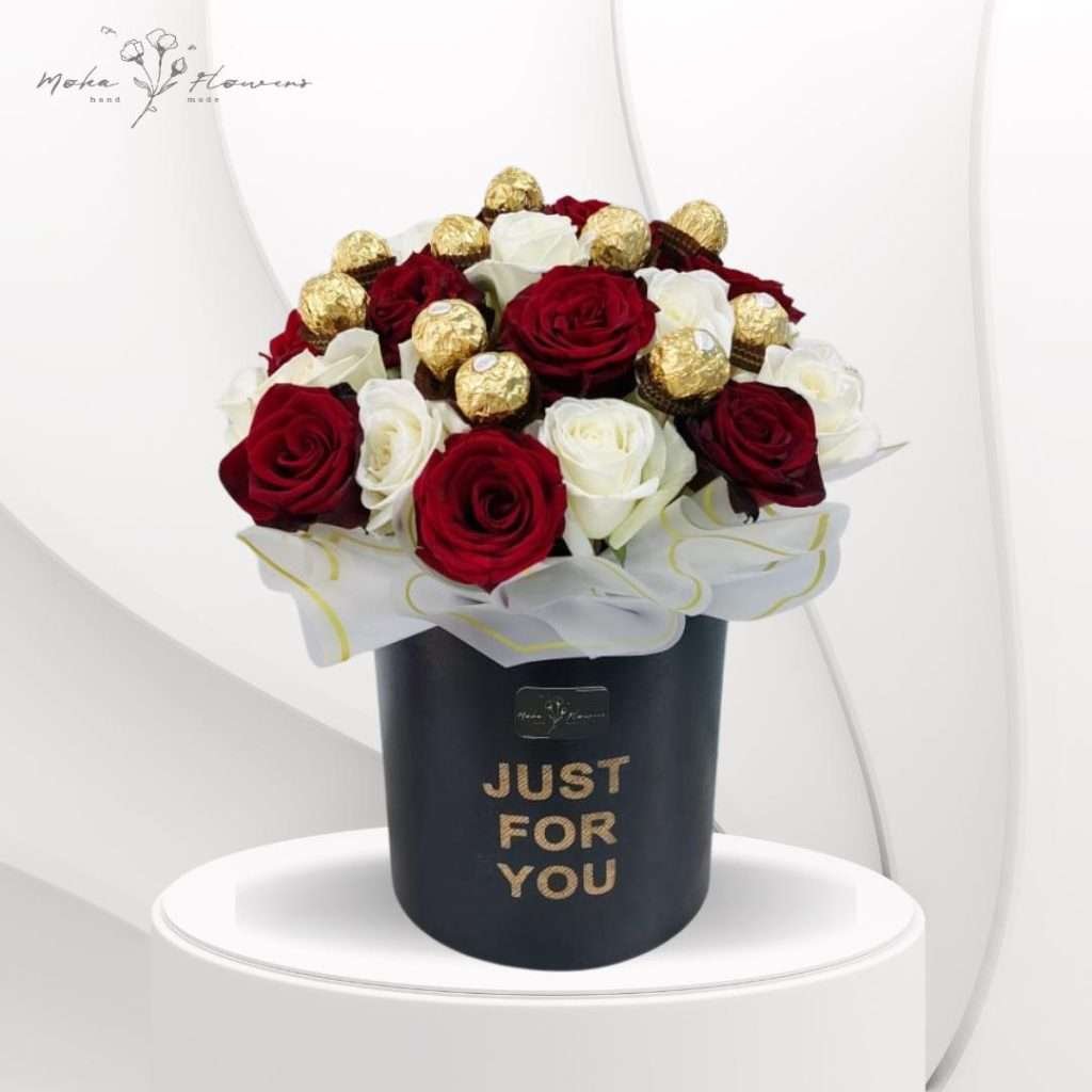 White and red roses with chocolate