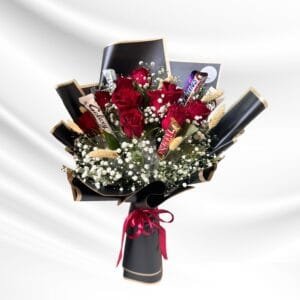 Bouquet of red roses with assorted chocolates