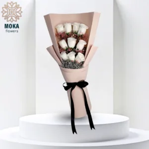 Artificial white roses