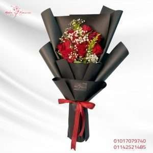 Cute red roses bouquet in black wrap - Code 52